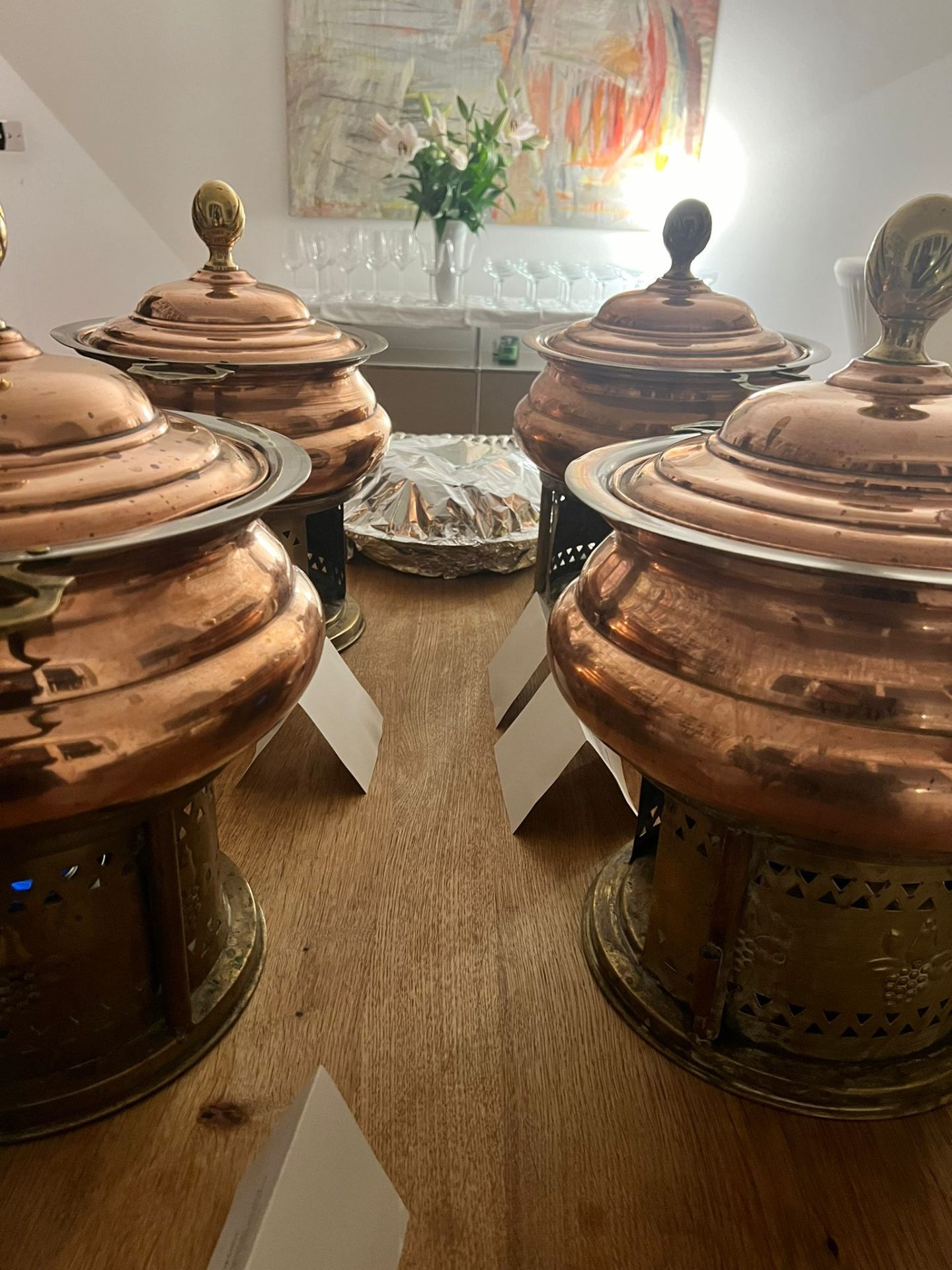 Four Jaflong copper chafing units warmed and ready for a private dinner service